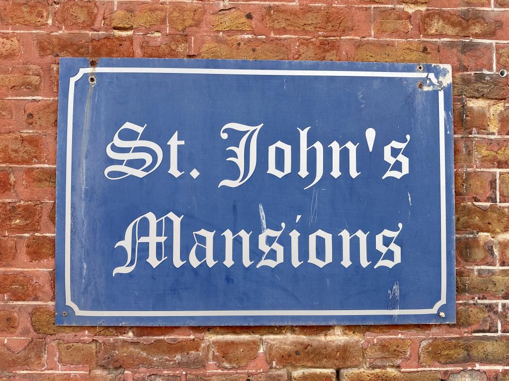 Lot: 54 - SUBSTANTIAL BLOCK OF 20 FLATS FOR IMMEDIATE INVESTMENT - St Johns mansions name plaque
